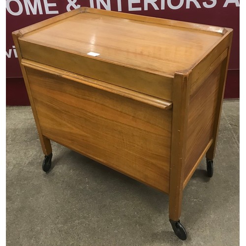 63 - A Compactum walnut trolley