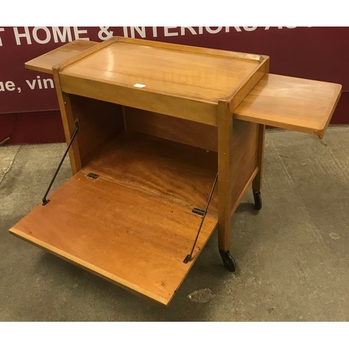 63 - A Compactum walnut trolley