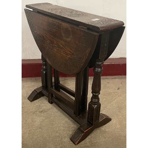 220 - A small 17th Century style carved oak gateleg table