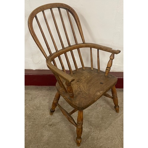 221 - A 19th Century elm and ash child's Windsor chair