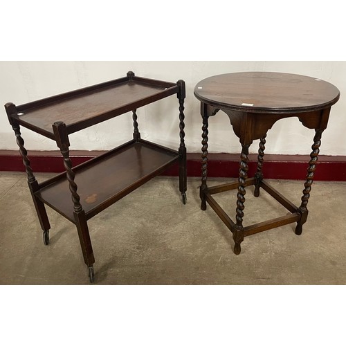 234 - An early 20th Century oak barleytwist trolley and an occasional table