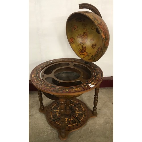 139 - An Italian terrestrial globe cocktail cabinet/trolley