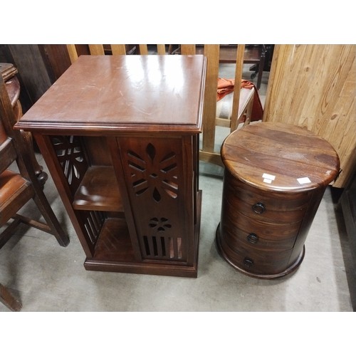 316 - A French style hardwood revolving bookcase and a cylindrical chest
