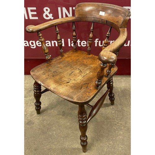 238 - A Victorian elm smokers bow chair