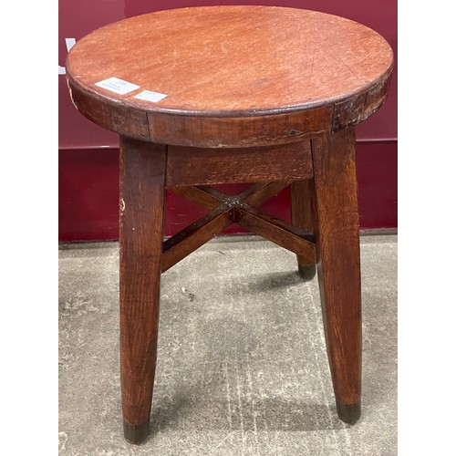 239 - An early 20th Century oak kitchen stool