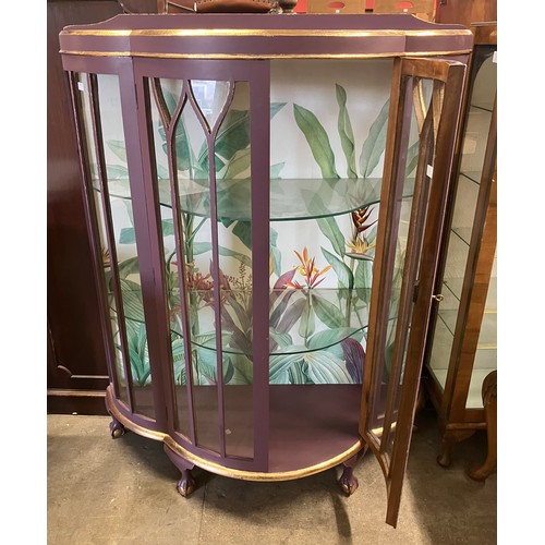 323 - An early 20th Century painted serpentine display cabinet
