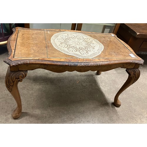 324 - An Art Deco walnut display cabinet and a mahogany and glass topped coffee table