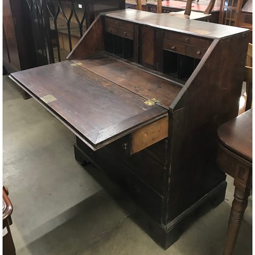 196 - A George II oak bureau