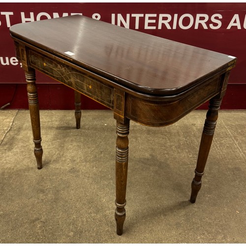 197 - A George IV inlaid mahogany foldover card table