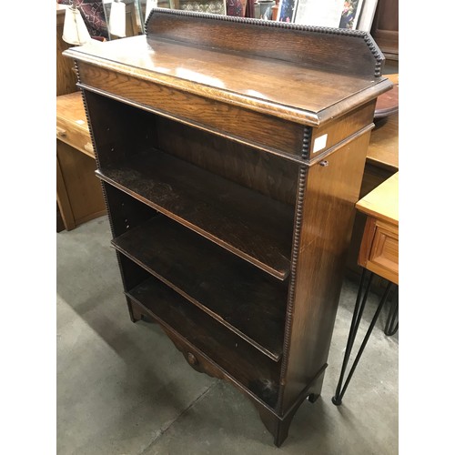 310 - An early 20th Century oak open bookcase