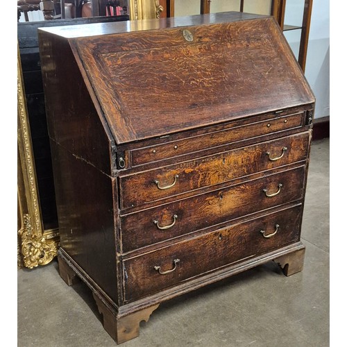 196A - A George II oak bureau