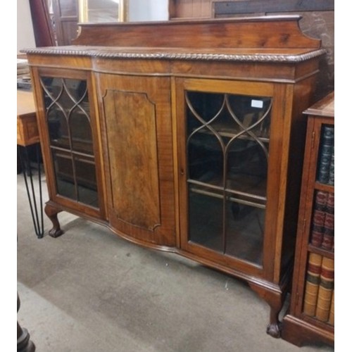 313 - An early 20th Century mahogany three door side by side bookcase