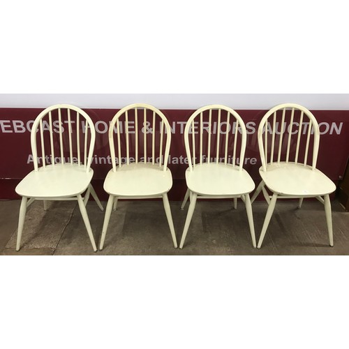 70 - A set of four painted Ercol elm and beech Windsor chairs
