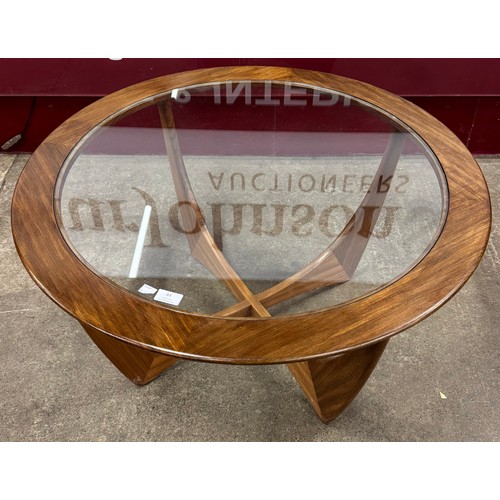 84 - A G-Plan Astro teak and glass topped circular coffee table