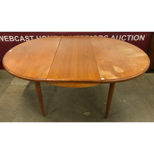 86 - A G-Plan Fresco teak extending dining table