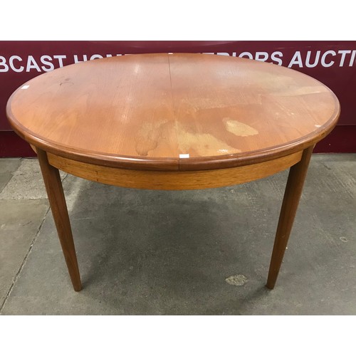 86 - A G-Plan Fresco teak extending dining table