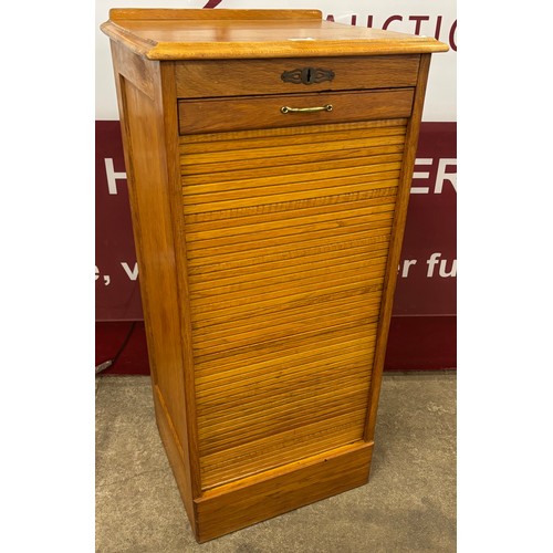 109 - An early 20th Century oak tambour front filing cabinet
