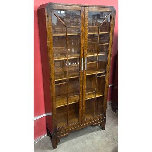 110 - An Art Deco oak two door bookcase