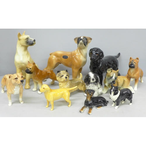 2080 - A collection of dog figures, some Beswick including English Bull Terrier, Coopercraft boxer, Sylvac