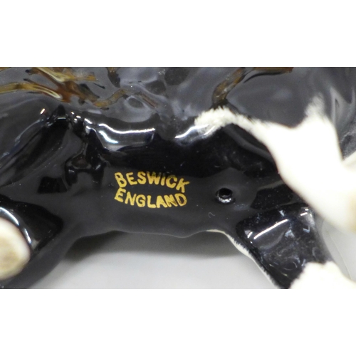 2080 - A collection of dog figures, some Beswick including English Bull Terrier, Coopercraft boxer, Sylvac