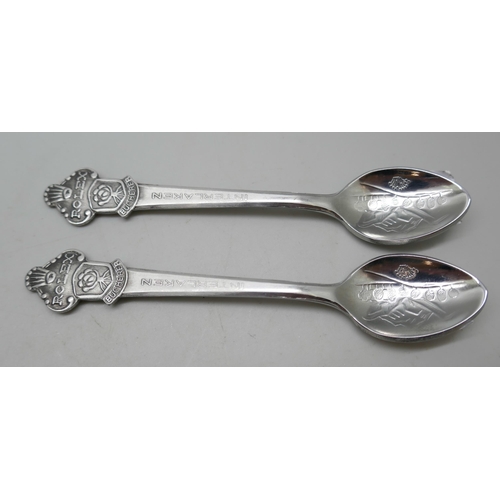 2086 - A pair of Rolex souvenir spoons