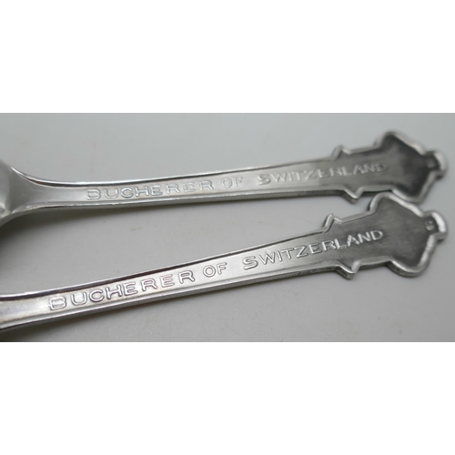 2086 - A pair of Rolex souvenir spoons