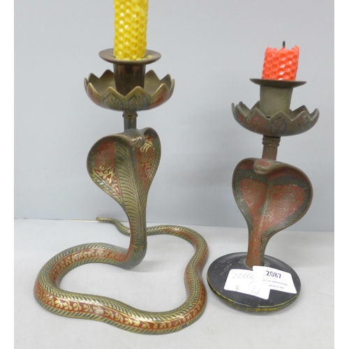 2087 - Two brass candlesticks with enamelled detail, in the form of serpents