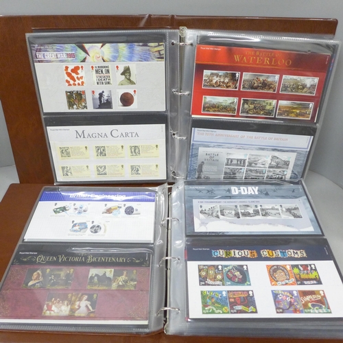 2091 - Stamps; two albums of Royal Mail presentation packs, some examples include Marvel, Aardman, D-Day an... 