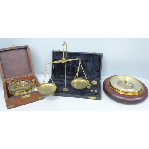 2093 - A German made barometer, a Lifeboats Sundial Compass and a set of balance scales
