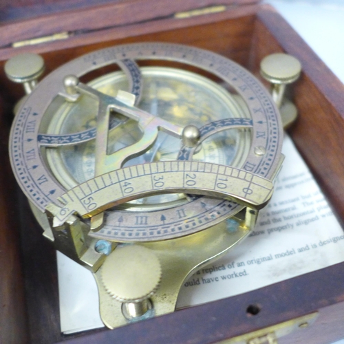 2093 - A German made barometer, a Lifeboats Sundial Compass and a set of balance scales