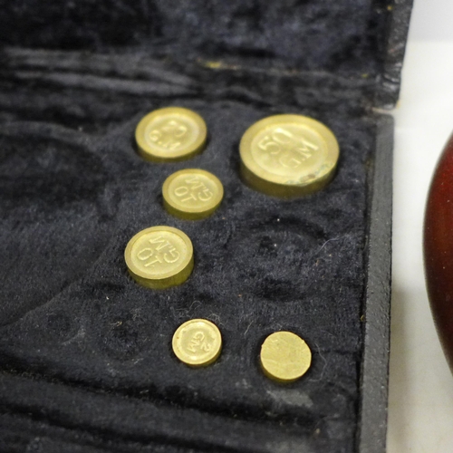 2093 - A German made barometer, a Lifeboats Sundial Compass and a set of balance scales