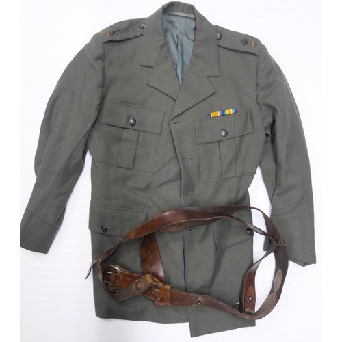 2098 - A collection of military issue and re-enactment uniforms including a bush shirt