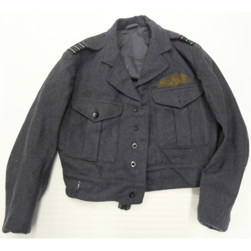 2098 - A collection of military issue and re-enactment uniforms including a bush shirt