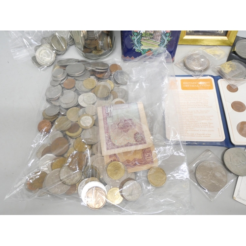 2101 - A collection of British and foreign coins and two bank notes, Dominica and Trinidad and Tobago