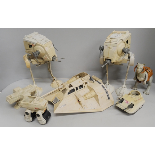 2114 - A collection of early Kenner Star Wars figures, together with some vehicles