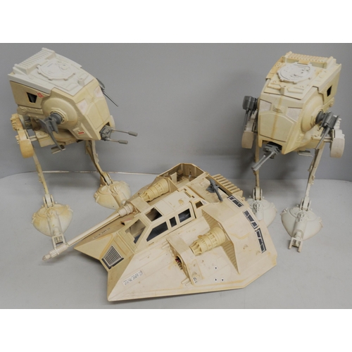 2114 - A collection of early Kenner Star Wars figures, together with some vehicles