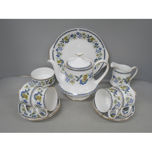 2120 - A Paragon porcelain tea service in Contessa pattern comprising teapot, seven tea cups and six coffee... 