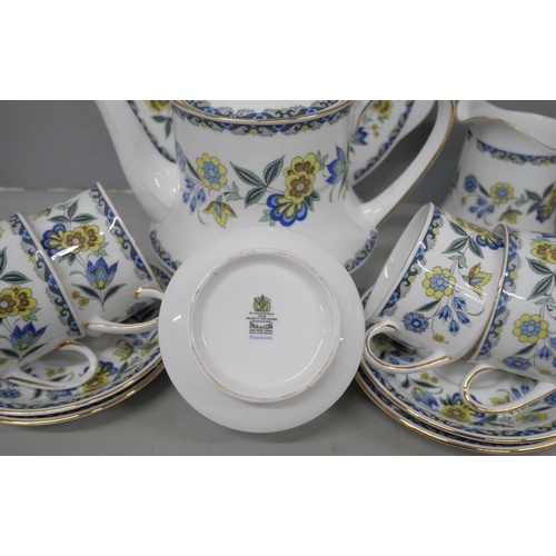 2120 - A Paragon porcelain tea service in Contessa pattern comprising teapot, seven tea cups and six coffee... 