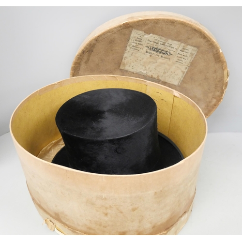 2128 - A vintage Lincoln Bennett & Co. silk top hat, boxed. Measuring approximately 20cm x 16cm internally.