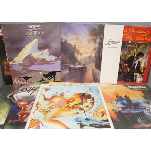 2132 - Twenty-four rock and metal vinyl LP records, including Dire Straits, Yes, Status Quo, Santana, Saxon... 