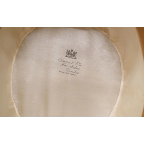 2146 - A vintage Dunn & Co London silk lined gentleman's hat measuring approximately 20cm internally and 16... 