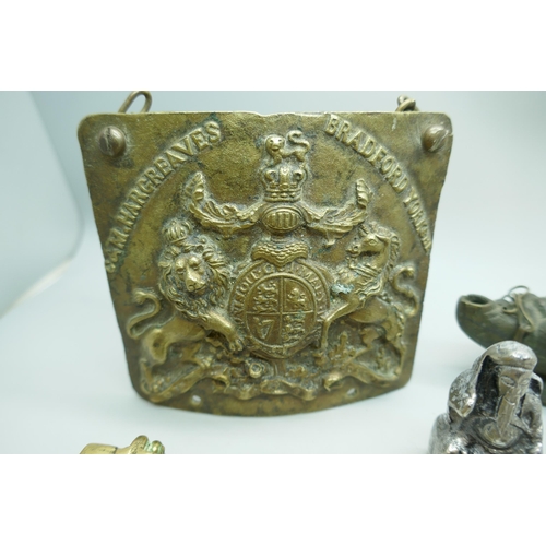 2181 - A brass box and plaque, a BP oil can cap, five Lincoln Imp spoons, etc.
