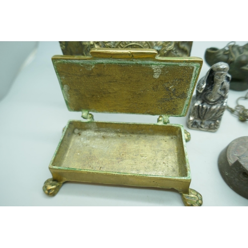 2181 - A brass box and plaque, a BP oil can cap, five Lincoln Imp spoons, etc.