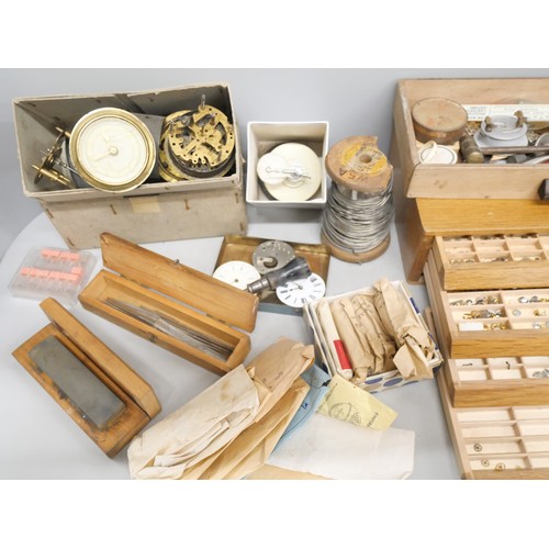 2099 - A collection of clock and watch parts, tools, etc.