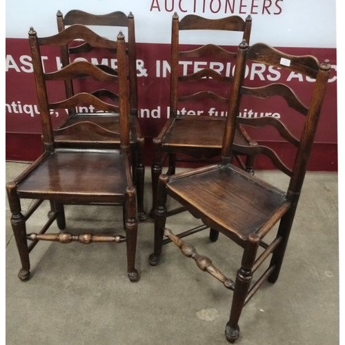 166 - A set of four George II elm ladderback chairs