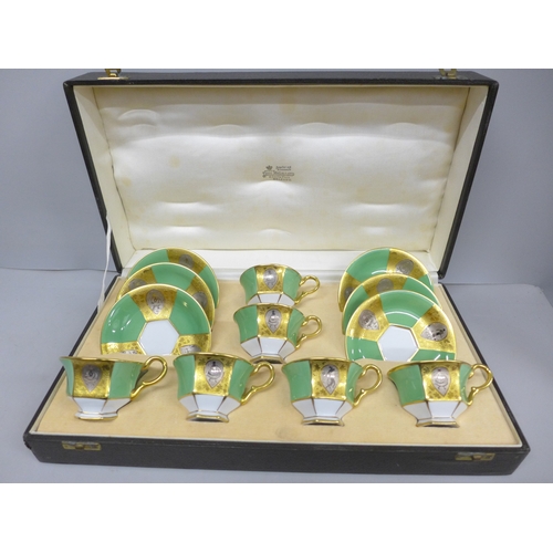 2096 - A Czechoslovakian Schlaggenwald six piece coffee set in green with gilt detail, case marked Thomas M... 