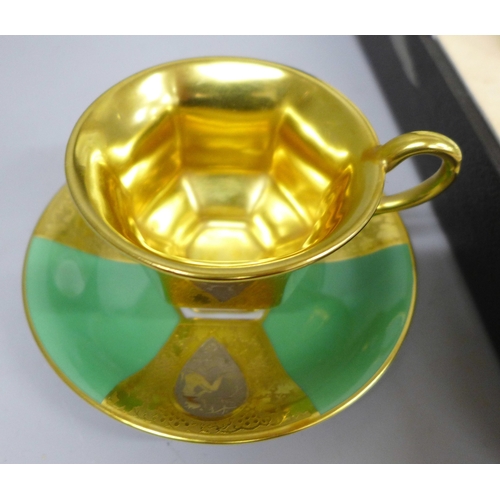 2096 - A Czechoslovakian Schlaggenwald six piece coffee set in green with gilt detail, case marked Thomas M... 