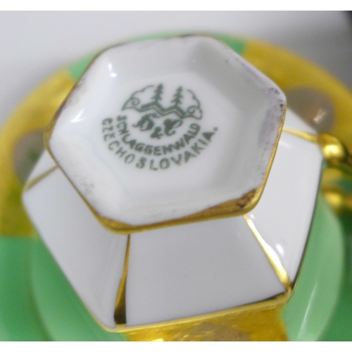 2096 - A Czechoslovakian Schlaggenwald six piece coffee set in green with gilt detail, case marked Thomas M... 