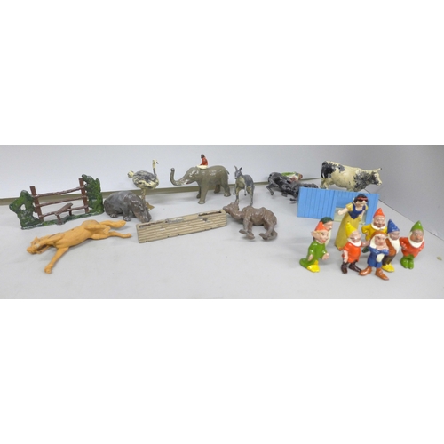 2106 - Snow White and the seven Dwarfs painted lead figures, a collection of painted lead farm and zoo anim... 