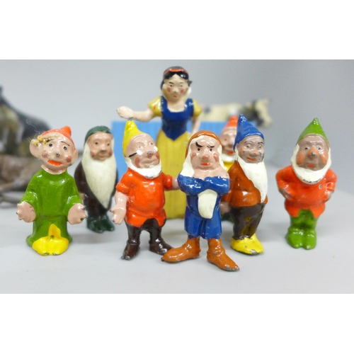 2106 - Snow White and the seven Dwarfs painted lead figures, a collection of painted lead farm and zoo anim... 